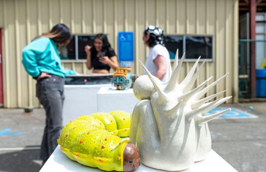 Students put together a trial run of the ceramics conference show. 