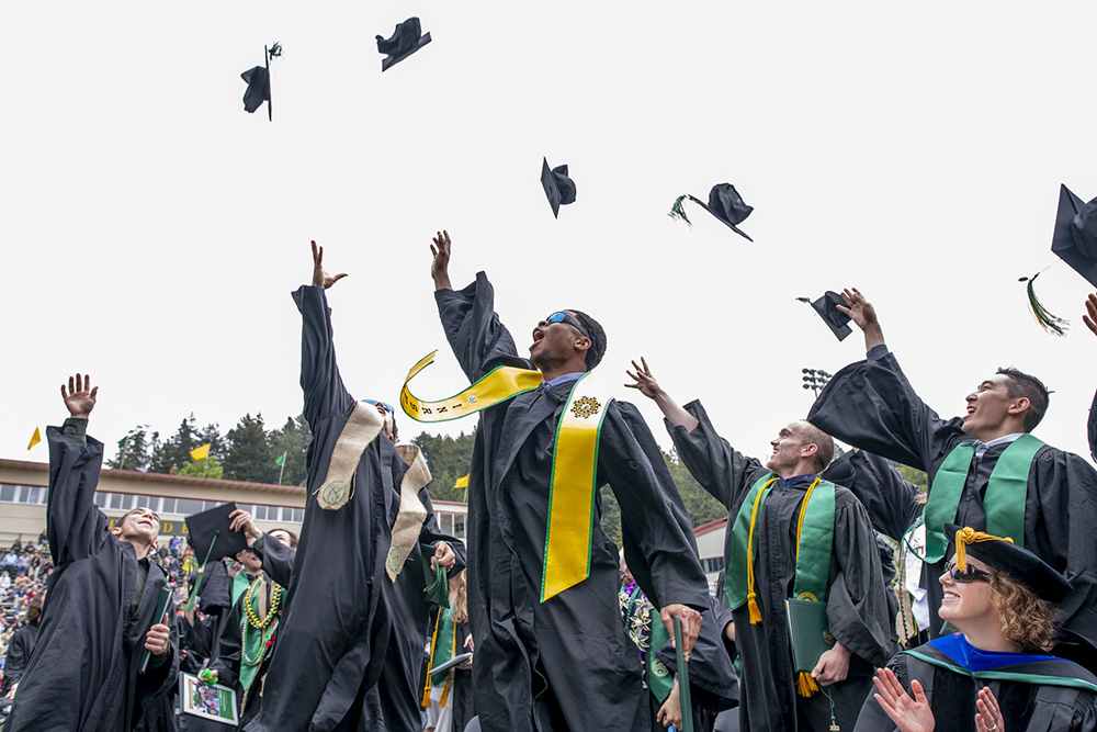 Caps tossed in the air at commencement