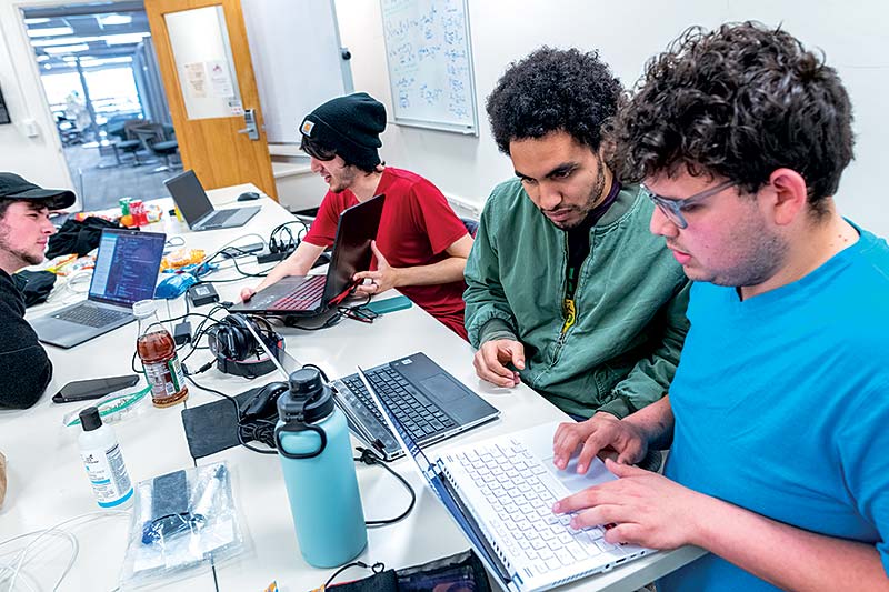 Students using laptop during Hackathon