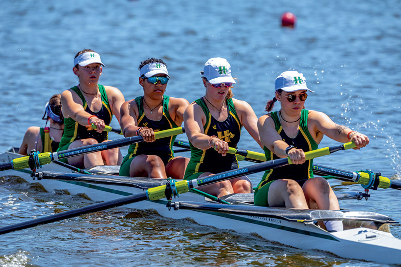 group of rowers on the water
