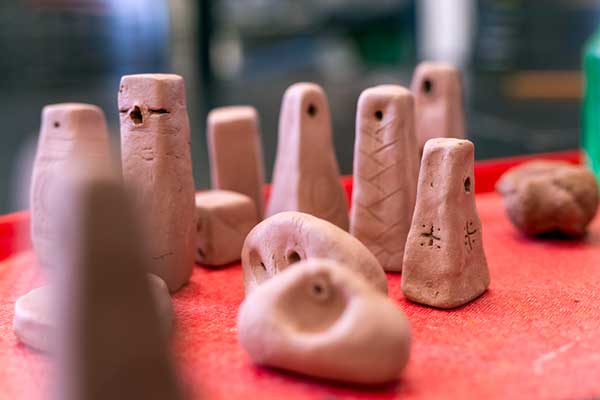 Cal Poly Humboldt students reconstructed Gradishte’s loom weights from clay in the campus Experimental Archaeology Lab, testing the replicas to explore how ancient communities wove textiles—and what these tools reveal about trade, technology, and daily life. Photo by Kellie Jo Brown.