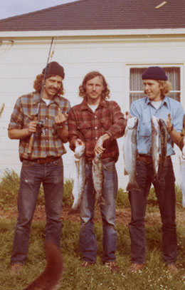 (From left to right): Ed Duncan, Tom Miles, and Dana Shuford holding their catch from a day of fishing.
