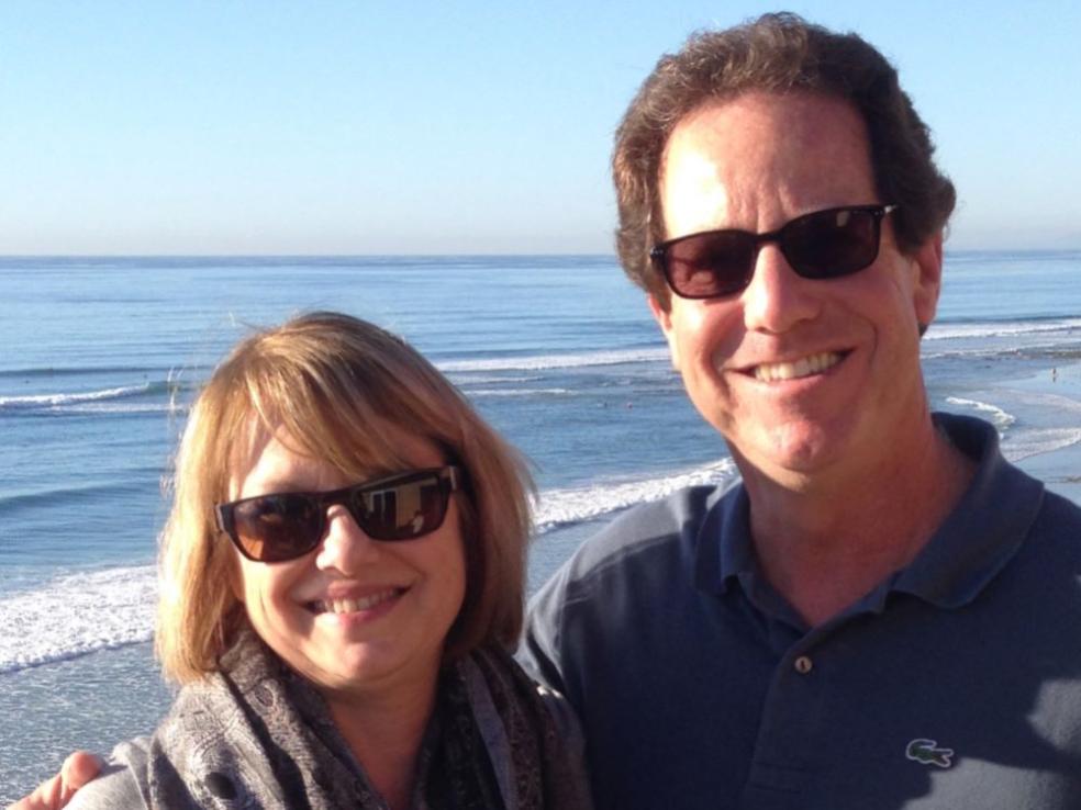 Two people in front of the ocean