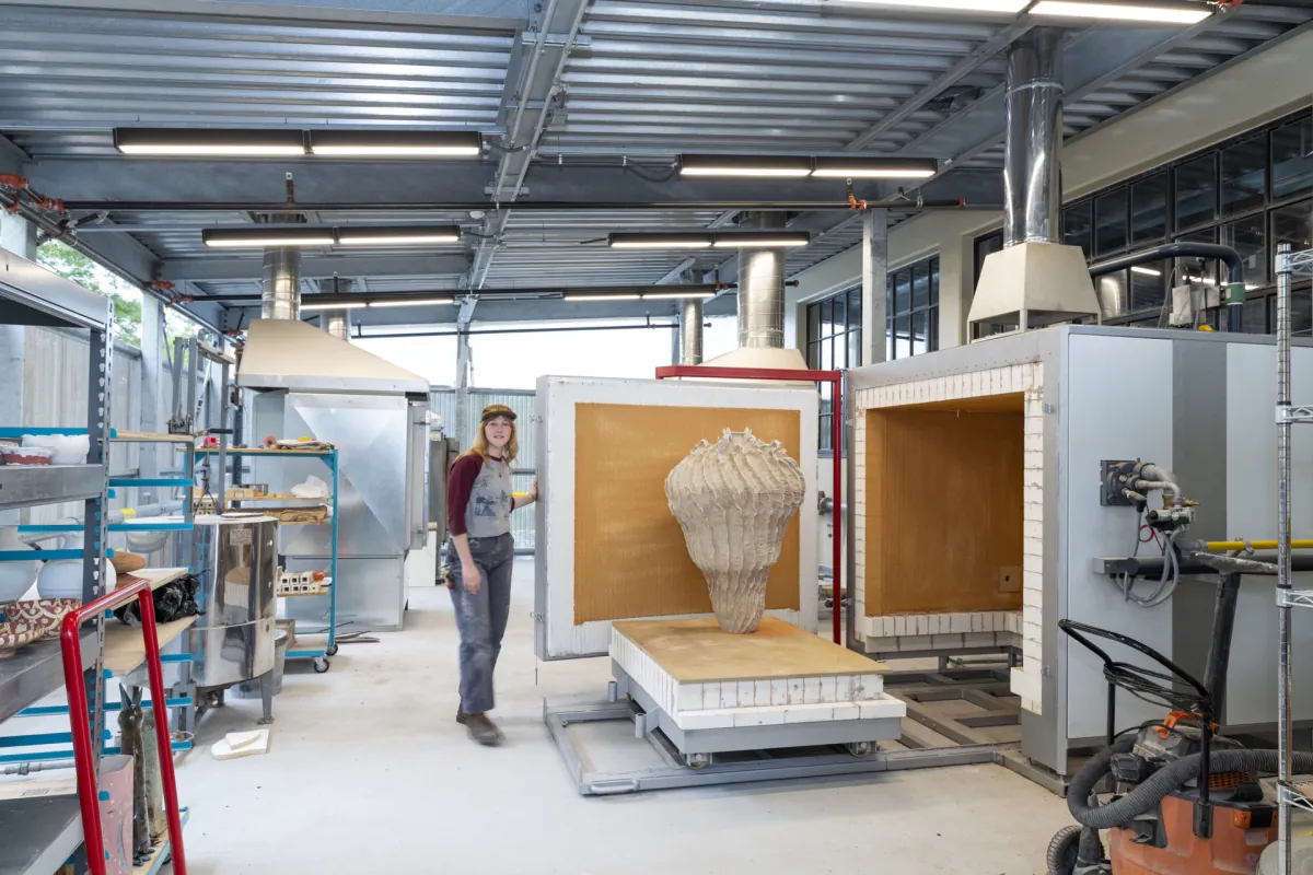 Large sculptural form staged beside kilns in Jenkins Hall