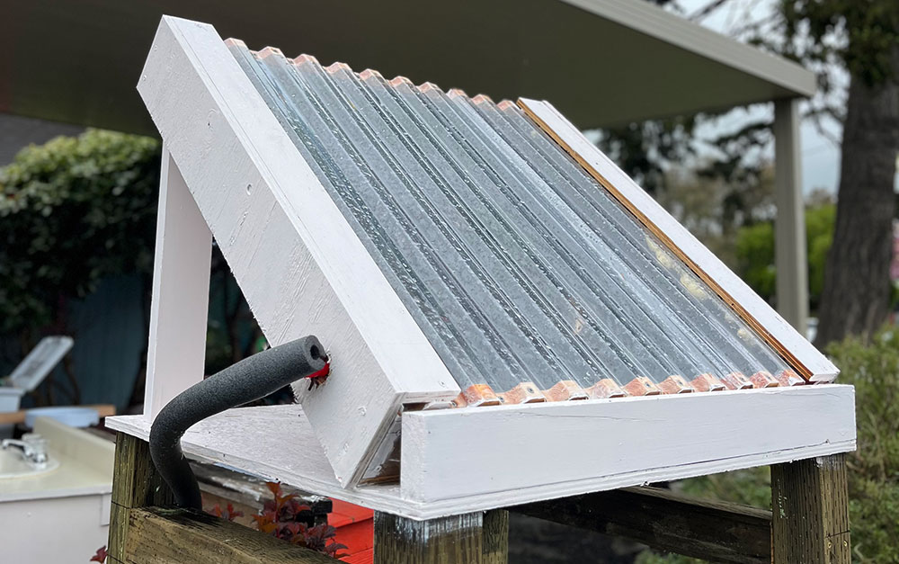 Cal Poly Humboldt Environmental Engineering Students designed a series  of interactive projects—including a PEX coil solar collector, shown above—to educate Trillium Charter students about  science and sustainability. Photo credit: Appropedia.