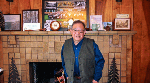 Cal Mukumoto, Oregon's official forester in his office.