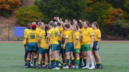 A photo of the Fall 2023 Humboldt Men's Rugby team cheering before a match. Photo by Riley McDaniel