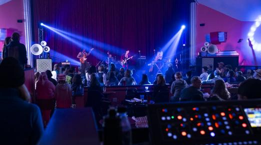 A photo of a band performing at the Arcata Theater Lounge on Cal Poly Humboldt Day Celebration in 2025. 