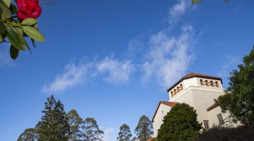 A photo of Founders Hall and a blue sky. 