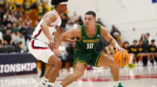 A photo of Cal Poly Humboldt basketball player Brandon Benton-Jackson on the court during the NCAA Tournament against East Bay.