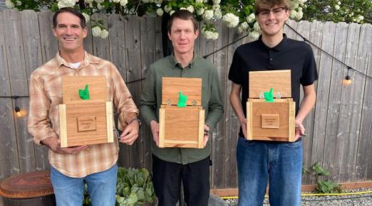 A photo of 2026 Sustainability Champion Awards (left to right): Justus Ortega (on behalf of Jennifer Ortega), Christopher Dubois, and Riley McDaniel