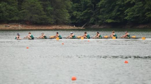 varsity 8 boat rowing on Lake Lanier