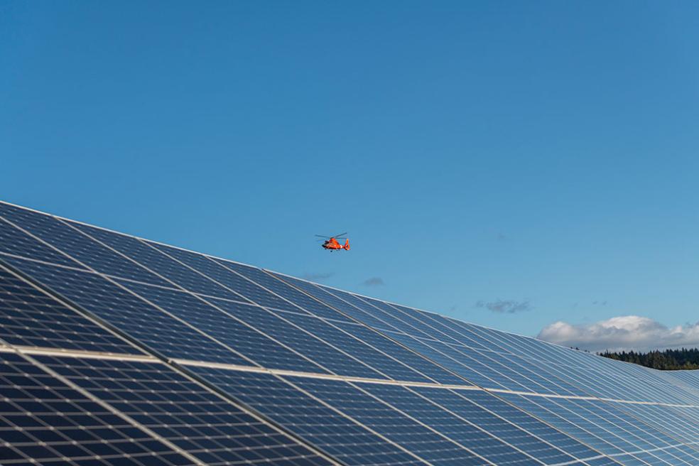 A Coast Guard helicopter lands at U.S. Coast Guard Air Station Humboldt Bay.