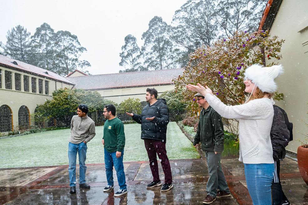 Catching snowflakes in the Founders Hall courtyard