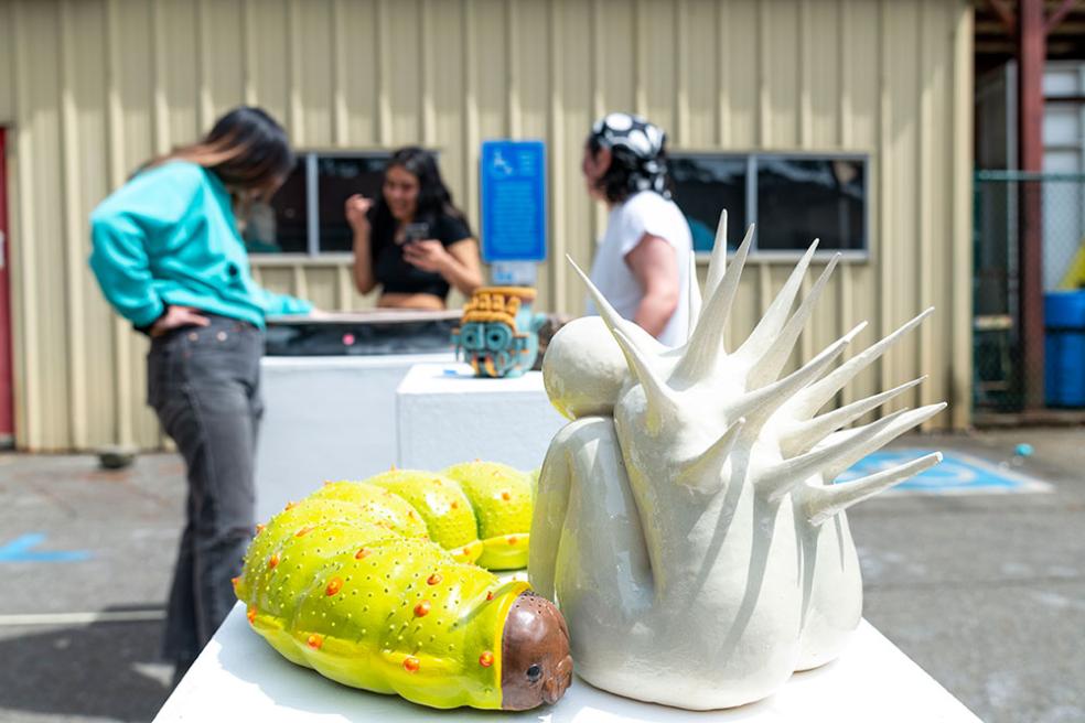 Students put together a trial run of the ceramics conference show. 