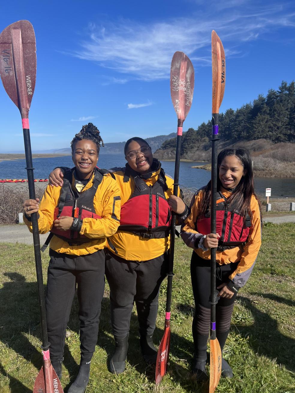 A photo of students at last year's Umoja's Black to the Land Paddle Out