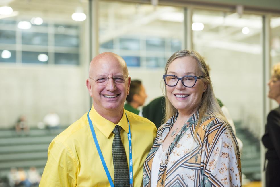 Former HSU women&#039;s rowing coach Robin Meiggs (R) and husband Scott Heller at the ceremony where the Robin Meiggs Scholarship Endowment was announced