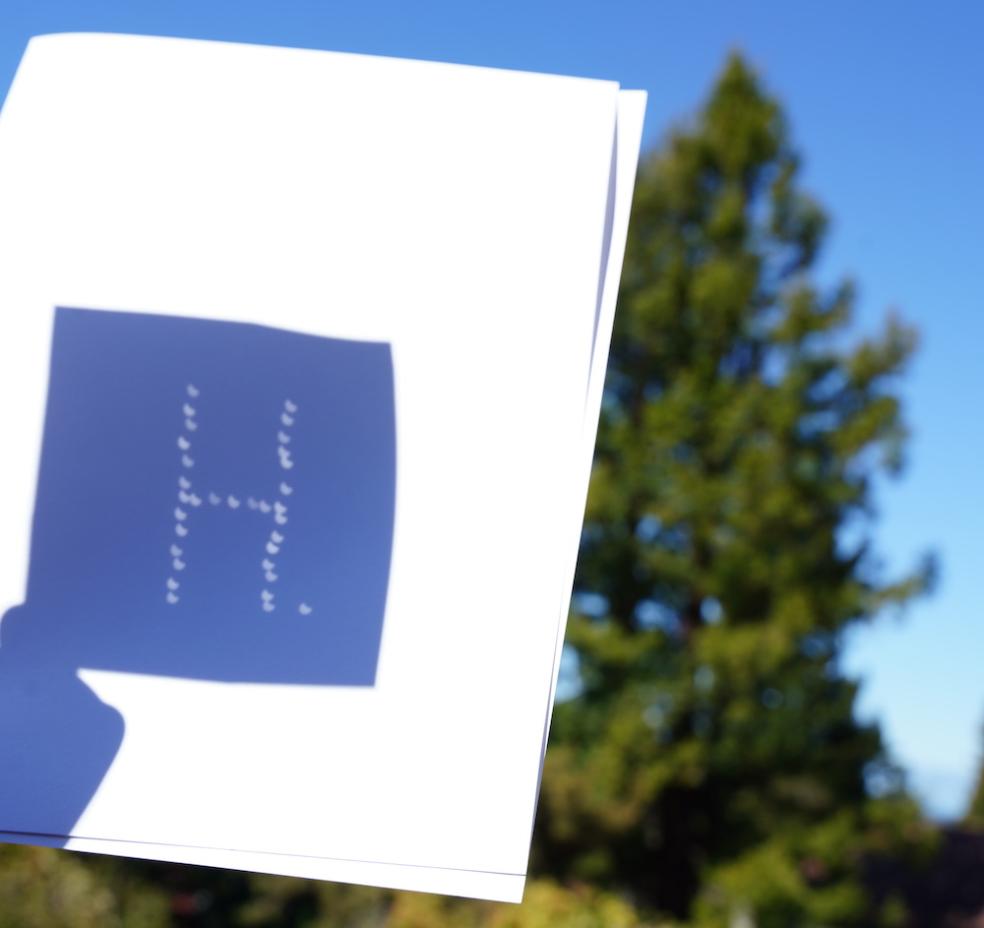 Pinhole projects show the crescent shape of the sunlight.