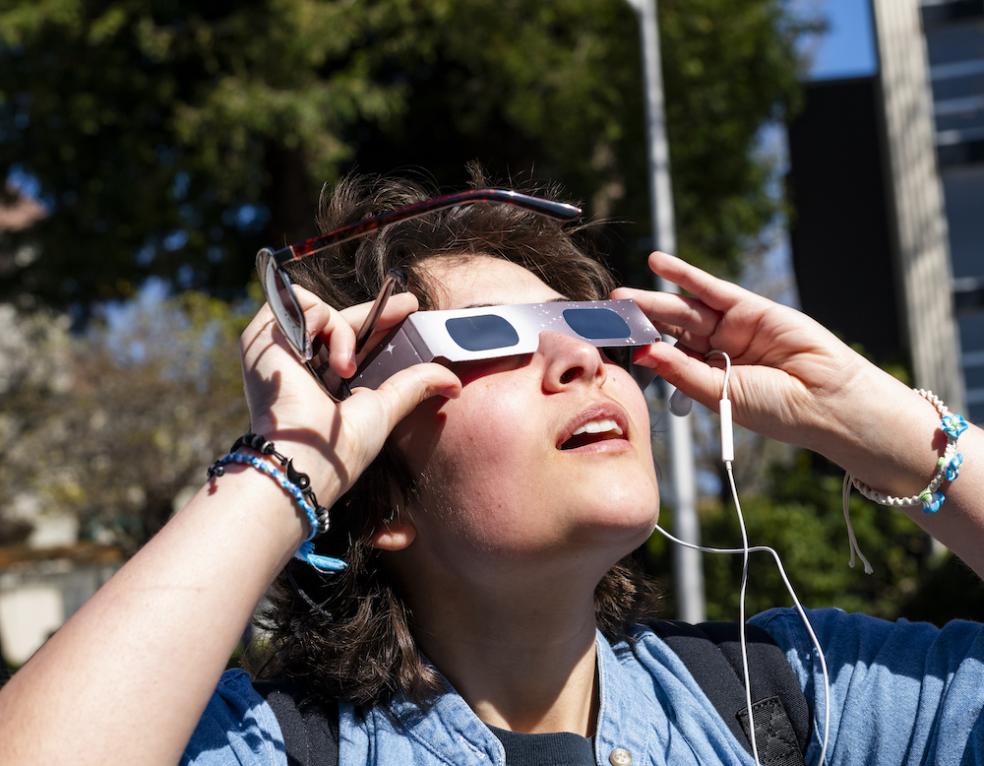 Trading sunglasses for eclipse glasses.