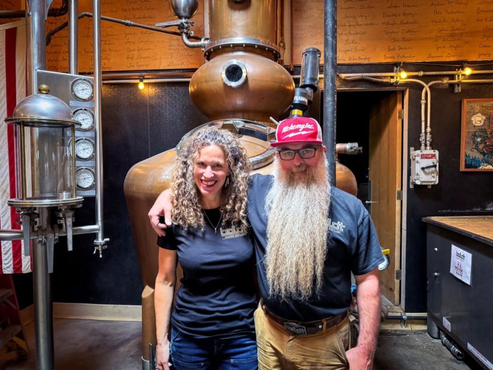 A photo of Amy and Steve Bohner from Alchemy Construction and Alchemy Distillery. 