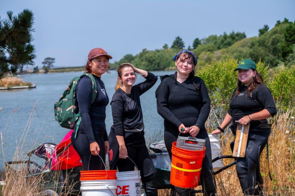Fisheries Biology grad students research on what otter's eat at the Arcata Marsh.