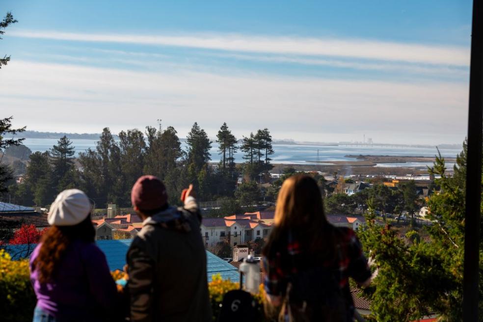 A photo of students looking onto Humboldt Bay from Founders Hall during the Dec. 5 earthquake and tsunami warning.