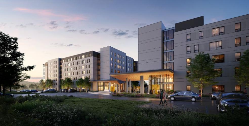 An artistic rendering of the Hinarr Hu Moulik student housing complex at dusk.