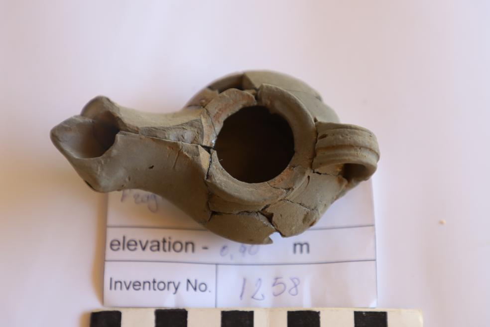 This oil lamp, discovered in 2024, was reconstructed and was last used over 2,000 years ago.