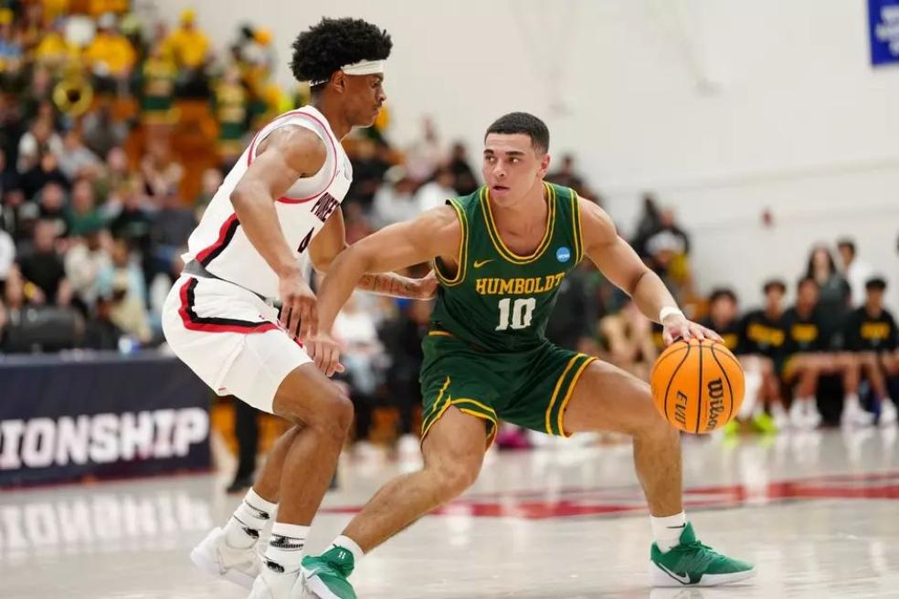 A photo of Cal Poly Humboldt basketball player Brandon Benton-Jackson on the court during the NCAA Tournament against East Bay.