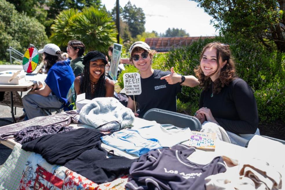 A photo of students tabling on the quad for the Earth Week Swap Meet. 