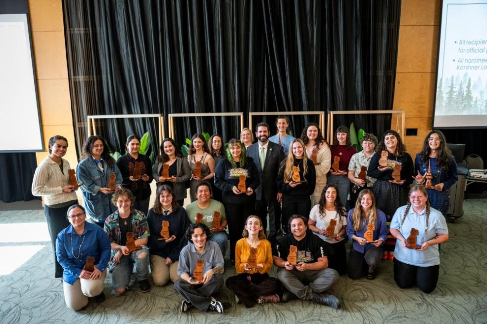A group photo of all of the Outstanding Student Award winners with President Richard Carvajal. 