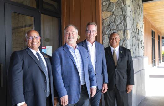 Front to back (College of the Redwoods President Keith Flamer, alumni and Lost Coast Ventures founders Dan Phillips and John Ballard, and Cal Poly Humboldt President Tom Jackson, Jr.