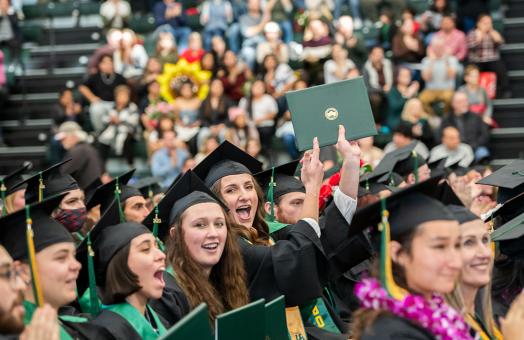 Students celebrate Fall 2023 Commencement.
