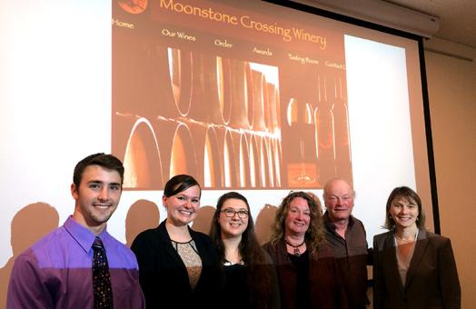 Moonstone Crossing Cancer Research Assistantship award recipients Sharon Otis, Rachel Brewer, and Logan Bailey post with winery owners Don Bremm (M.S. ‘88, Natural Resources) and Sharon Hanks (B.A. ‘79), and Amy Sprowles, professor of Biological Sciences.