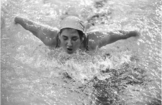 Robin Smith during dual swim meet in the late 1970s as a member of HSU&#039;s Women&#039;s Swimming and Diving Team.