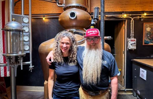 A photo of Amy and Steve Bohner from Alchemy Construction and Alchemy Distillery. 