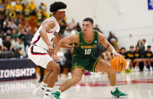 A photo of Cal Poly Humboldt basketball player Brandon Benton-Jackson on the court during the NCAA Tournament against East Bay.