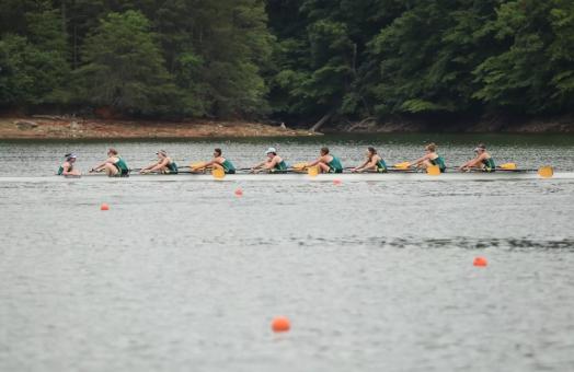 varsity 8 boat rowing on Lake Lanier