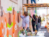 Students from Redwood Coast Montessori High School designed and painted the mural with help from instructors, Cal Poly Humboldt Art Education students, and community members.