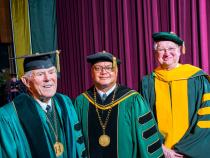 At the investiture of President Tom Jackson, Jr. (center) are former presidents Alistair MCrone (left) and Rollin Richmond.