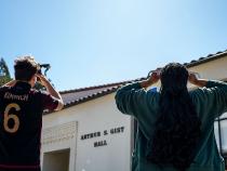 Students watched the eclipse peak locally at 11:16 a.m.