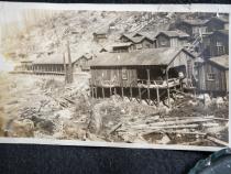 Maggie’s Camp (pictured in the forefront), named after Falk’s lead cook, Maggie McNeil, with cabins in the background which housed workers who sometimes toiled in the mill for 12+ hours a day.