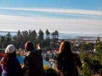 A photo of students looking onto Humboldt Bay from Founders Hall during the Dec. 5 earthquake and tsunami warning.