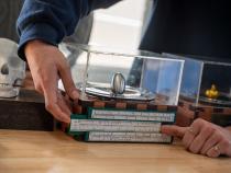 The Physical Sciences and Mathematics Trophy features a spinning Columbus egg.