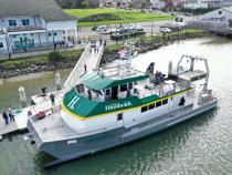 A drone still of the R/V North Wind docked in the Humboldt Bay.