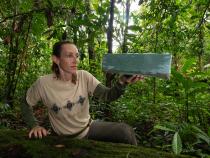 Zoology Professor Silvia Pavan holds up a Sherman trap, used to collect specimens in the field. Researchers extract DNA from the samples to better understand the animal’s evolutionary history on Marajó Island. Photo by Pedro Peloso.