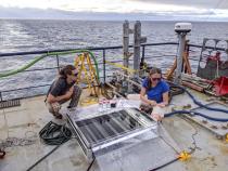 The Humboldt Chemistry Trace Metal Team performed an incubation at sea, adding iron and observing the effect on the phytoplankton. Noah Schuhmann (left) and Claire Till (right) take the first sample of their incubation. Photo credit: Ralph Till.
