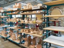 Rows of student work line the shelves in Jenkins Hall.